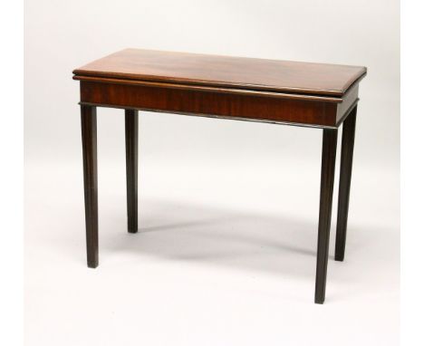 A GEORGE III MAHOGANY RECTANGULAR FOLD-OVER CARD TABLE, on moulded square legs. 3ft 1ins wide x 1ft 6ins deep x 2ft 5ins high