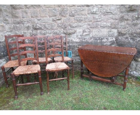 An oak gate leg table, width 42ins x depth 55ins x height 29ins, together with five ladder back chairs