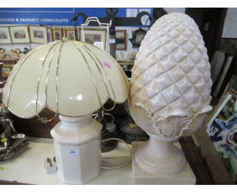 Two lamps, two door stops, large model pineapple and a metal tray