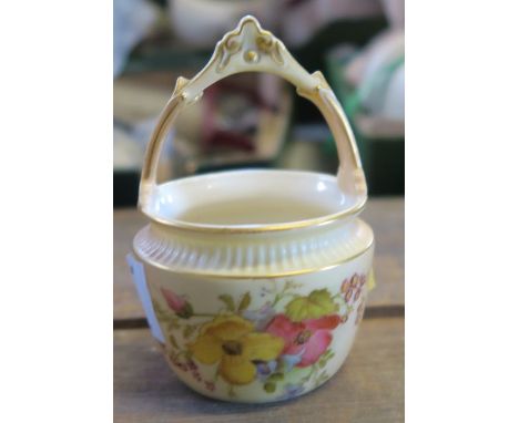 A Royal Worcester blush ivory pot, decorated with floral sprays, shape number 1880, height 3.75ins