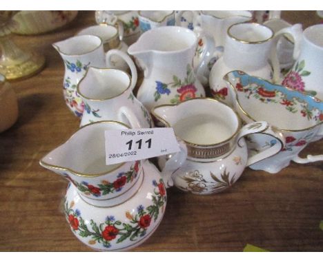 A collection of reproduction Royal Worcester jugs