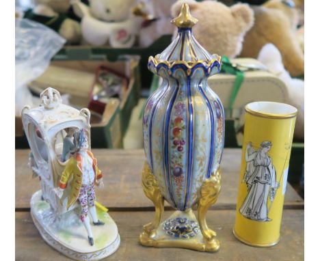 A Continental porcelain covered vase, height 7.5ins, together with a porcelain model of two figures carrying a sedan chair an