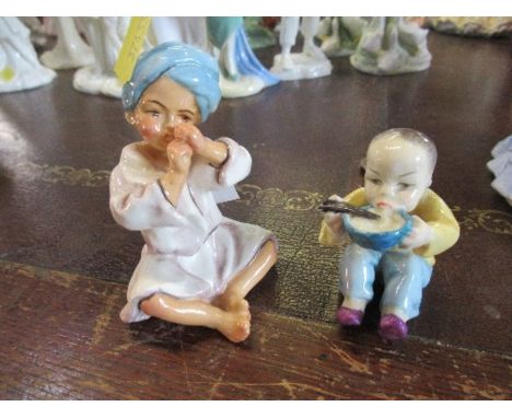 Two Royal Worcester figures, after Freda Doughty Children of the Nations, India and China