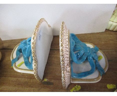 A pair of Royal Worcester turquoise ribbon wall brackets