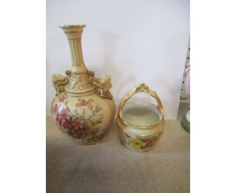 A Royal Worcester blush ivory twin mask vase, and a small well bucket vase