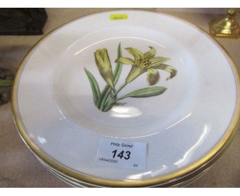 Four Royal Worcester plates, decorated with flowers