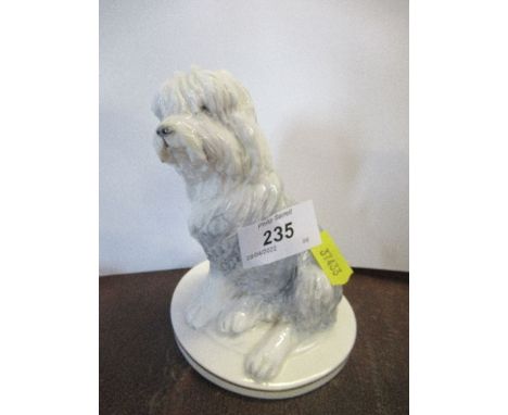 A Royal Worcester Old English puppy model, modelled by K.Potts