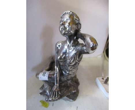 A metal model of a lady