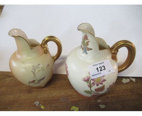 A Royal Worcester blush ivory flat back jug, and a gilded ivory flat back jug