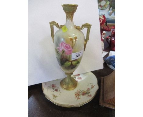 A Royal Worcester vase, decorated with roses, together with two gilded ivory plates