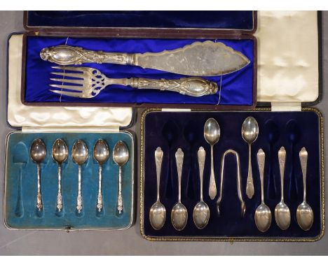 Fish Knife &amp; Fork Serving Set, Pierced &amp; Engraved together with two uncompleted set of silver spoons in their origina