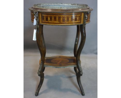 A marquetry inlaid mahogany planter, with metal mounts depicting beast heads and flowers,  with metal planter to top and havi