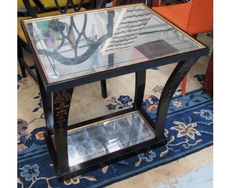 LAMP TABLE, silver leaf, black and gilt, with an undertier on curved supports, 61cm W x 66cm H x 51cm D (with slight faults).