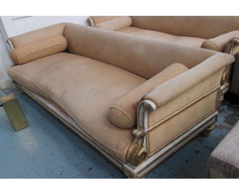 JACINTO USAN SOFA, three seater, in a gold coloured fabric on a distressed gilded and painted frame, plus bolster cushions, 2