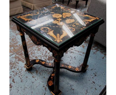 LAMP TABLE, black and gilt foliate patterned, with a square glass top on turned supports joined by a wavy stretcher, 61.5cm x