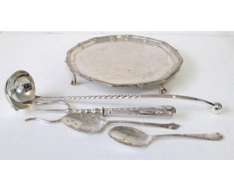 SILVER SALVER, Sheffield 1919, raised on four lion paw feet, a Cristofle silver ladle, two silver engraved spoons and a toast