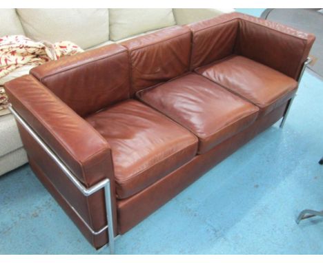 SOFA, Le Corbusier style, in soft brown leather, with three seat cushions and chromium frame, 178cm x 65cm H x 68cm.