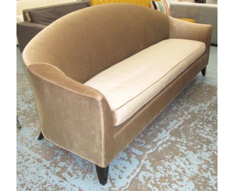 SOFA, of large proportions, two seater, in gold velour with humped back on ebonised square supports, 214cm L. 