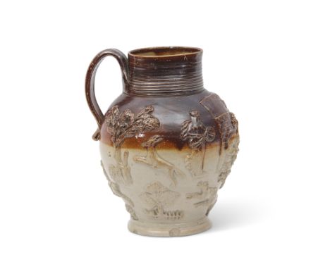 Early 19th century Mortlake Kishere saltglaze jug modelled in relief with various hunting subjects, the front with a moulded 