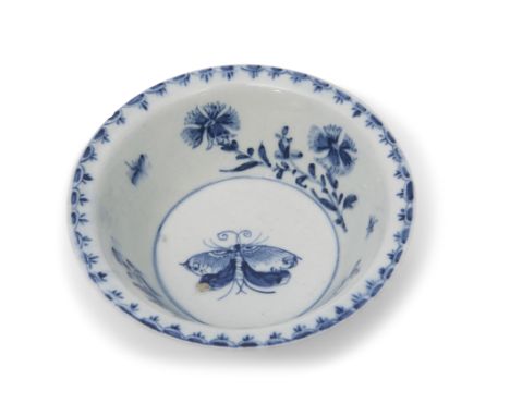 Large 18th century Lowestoft porcelain patti-pan decorated in underglaze blue with trailing flowers, the interior with butter