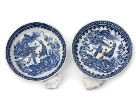 Pair of 18th century Caughley porcelain egg drainers with a blue and white fisherman printed pattern, the base of one with fa