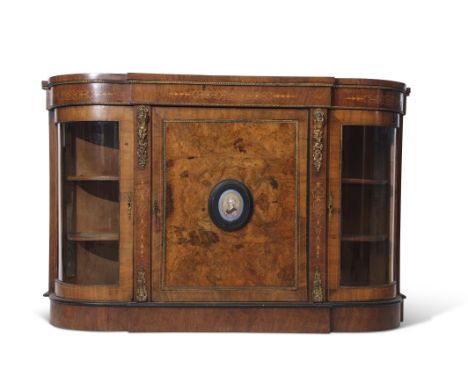 19th century walnut credenza with satinwood inlay and decorative brass mounts, fitted centrally with single door with a raise