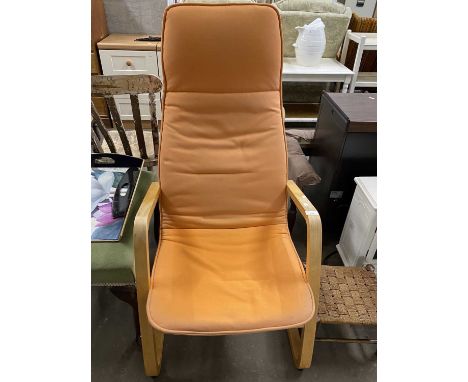 Modern light wood framed armchair