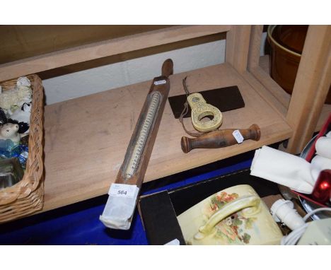 Dr Forbes specifications thermometer together with a dough slicer and piece of bone scrimshaw