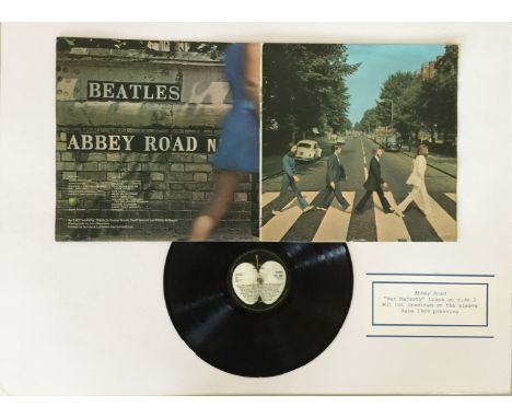 ABBEY ROAD MISPRINT SLEEVE FRAMED/LENNON PORTRAIT. A mounted and framed presentation to include disc and sleeve of the sought