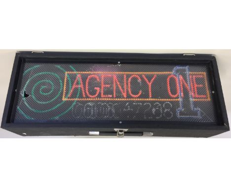 UV LIGHT BOX. A UV disco light box to read 'Agency One'. Measures approx 63 cm across, sold with kettle lead.