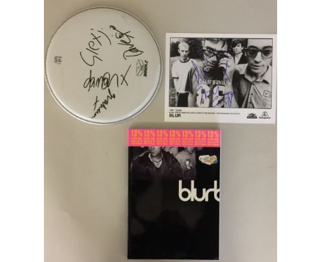 BLUR SIGNED. Three autographed pieces of memorabilia to include: An autographed drumhead by Damon Albarn, Graham Coxon, Alex 