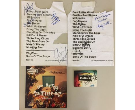 OASIS / BEADY EYE SIGNED. Four pieces of signed memorabilia to include: A copy of the 'Im Outta Time Remixes' 7" single signe