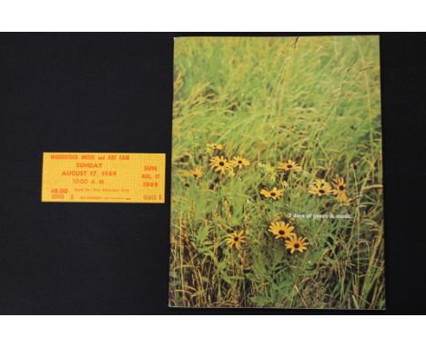 JIMI HENDRIX. A reprint 3 days of peace and music programme with an unused ticket from Woodstock August 17th, 1969 where Jimi