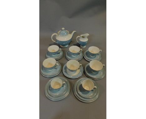 A Royal Doulton tea service in pale blue floral glaze. 