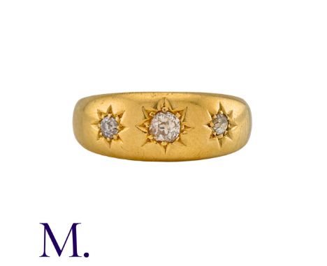 A Diamond Gypsy Ring in 18K yellow gold set three old cut diamonds.  Hallmarked for 18ct gold.Size:Weight: 2.7g 