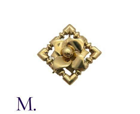 A Gold Pendant Brooch in 9K yellow gold, depicting a flower in square frame.  With brooch and pendant setting.Size: 2.8cmWeig