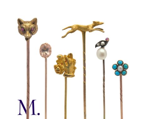 A Collection of Antique Stick Pins in yellow gold including one set with golden topaz (7.4cm), one with pearl, diamonds and a