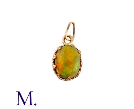 A Cabochon Opal Pendant in yellow gold, set with a cabochon opal of approximately 1.50cts. Unmarked but tests indicate 9 cara