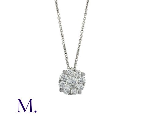 A Diamond Pendant and Chain in 18K white gold.  Pendant set with a round brilliant diamond weighing approximately 0.25ct to t