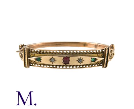A Victorian Paste Bangle in 9K rose gold, with ropework and beading motifs. Stamped 375 for 9 carat gold. Size: 5.8cm Weight: