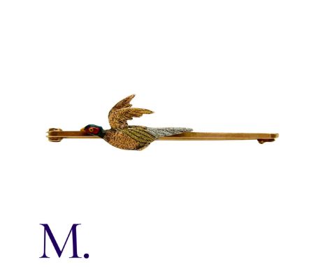 An Antique Pheasant Bar Brooch in 14K yellow gold and platinum, depicting a pheasant in flight.  Brooch marked 14ct Plat.Size