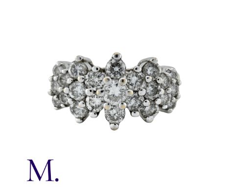 A Diamond Triple Cluster Ring in 9k yellow and white gold, comprising three clusters of diamonds all totalling approximately 
