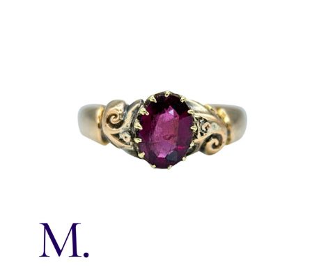 An Antique Garnet Ring in 18K set with an oval-cut garnet (approximately 7x5mm).  Hallmarked for 18ct gold.Size: PWeight: 2.3