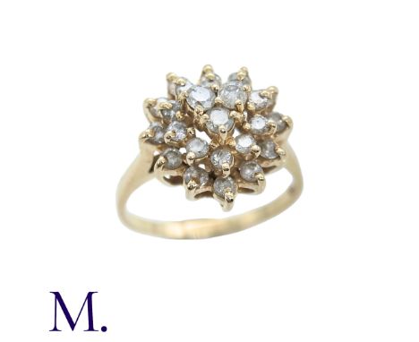 A Diamond Cluster Ring in 14k gold, set with a cluster of round cut diamonds. Stamped 14K, RL.Size: OWeight: 4.1g. 