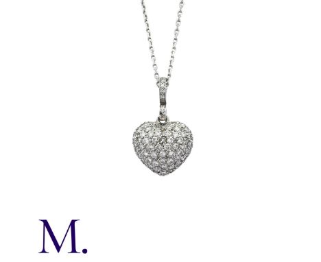 A Diamond Heart Pendant with Chain in 18K white gold, pavé set with diamonds, with diamond bail.  French mark to chain indica