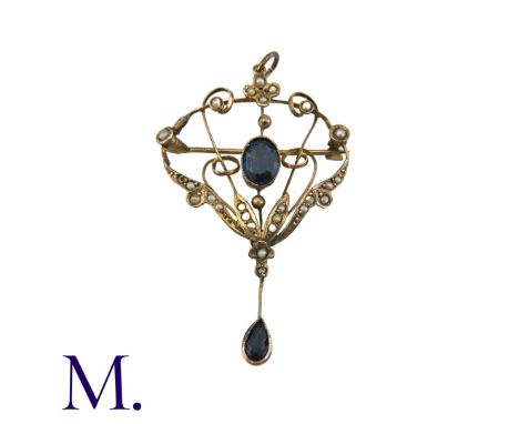 A Blue Paste And Pearl Brooch Pendant in 9k yellow gold, the openwork scrolling and foliate form set with an oval cut blue pa