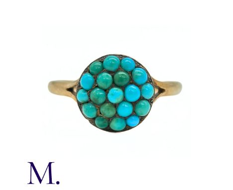 An Antique Turquoise Ring in yellow gold, the face pave set with cabochon turquoise. (Untested but tests indicate 9 carat gol