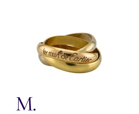 CARTIER. A Cartier Trinity Ring in 18K rose, white and yellow gold.  Engraved 'Les Must de Cartier' to the rose gold band, si