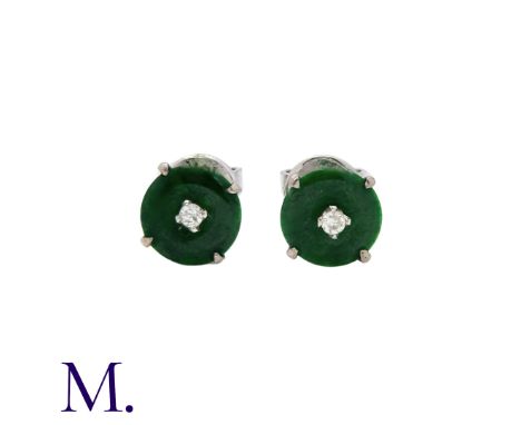 A Pair of Jade and Diamond Earrings in 18K white gold, set with a jade discs of approximately 6mm in diameter with a small di