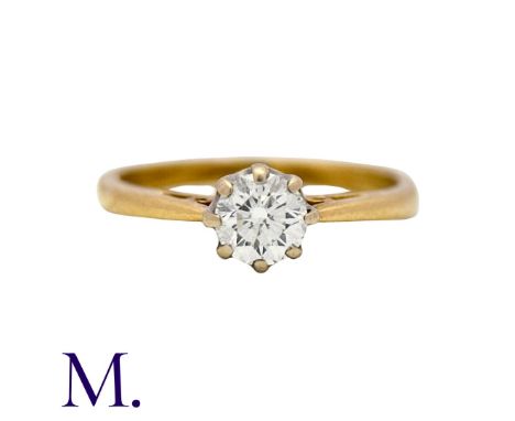 A Diamond Solitaire Ring in 18K yellow gold, set with a round brilliant diamond weighing approximately 0.50ct.   Hallmarked f